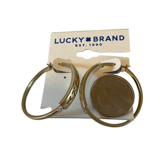 Embossed “Lucky” Gold Toned Hoops - Picture 6 of 6